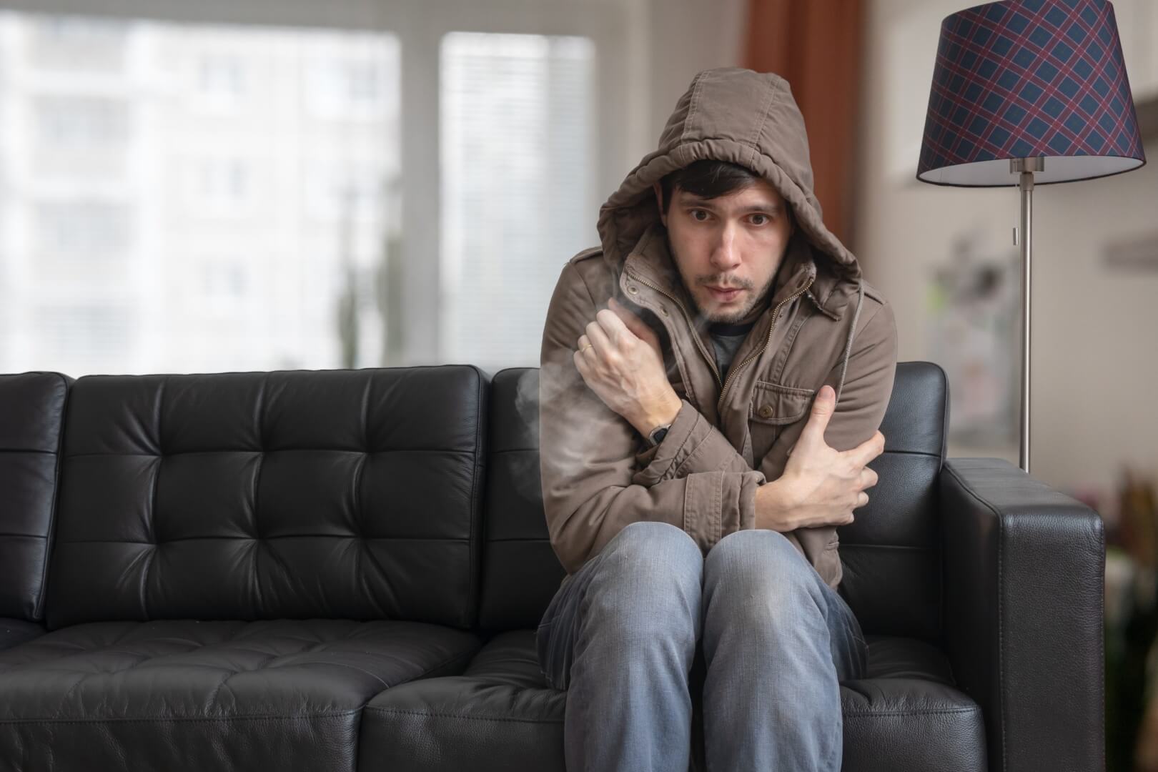A Man Feeling Cold Due to Broken Furnace