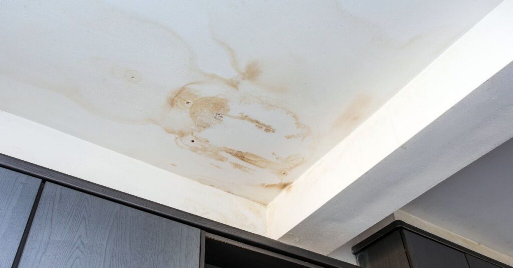 Water stain on ceiling caused by hidden plumbing leak