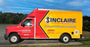 Sinclaire Home Services branded HVAC service truck at a customer home in Walpole Massachusetts